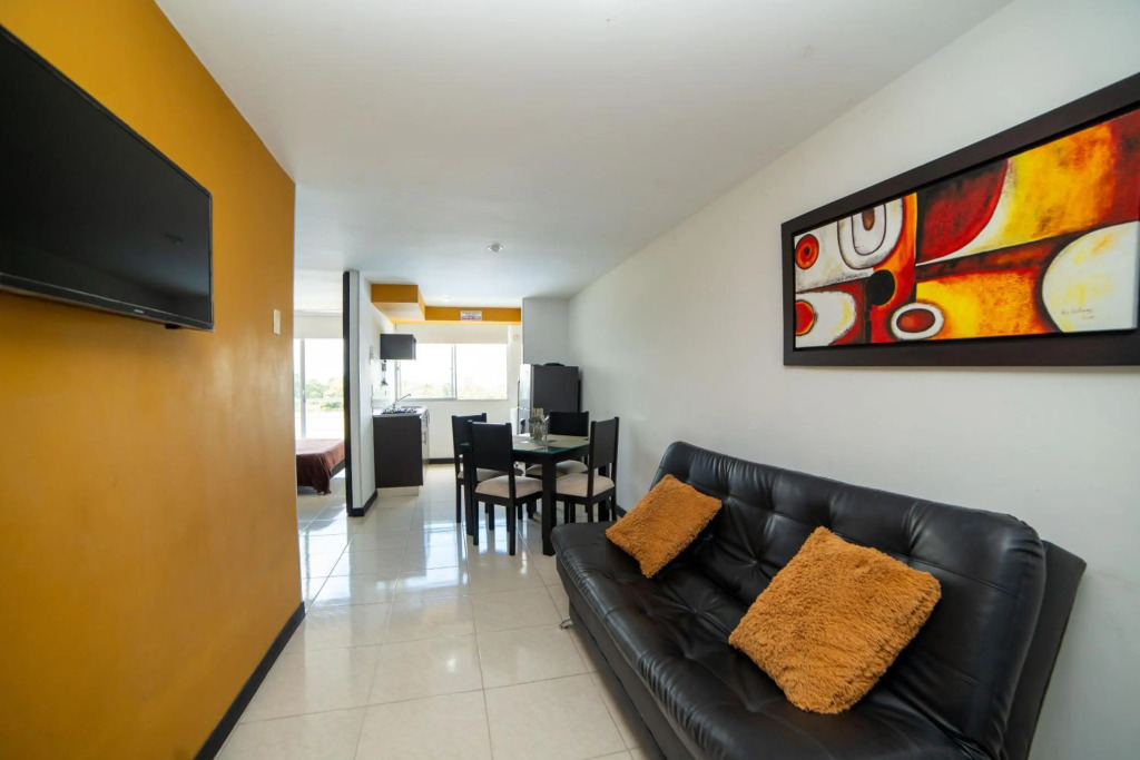 Apartamento con Parqueadero Piscinas y Wifi en Montenegro a 5 min del Parque del Café