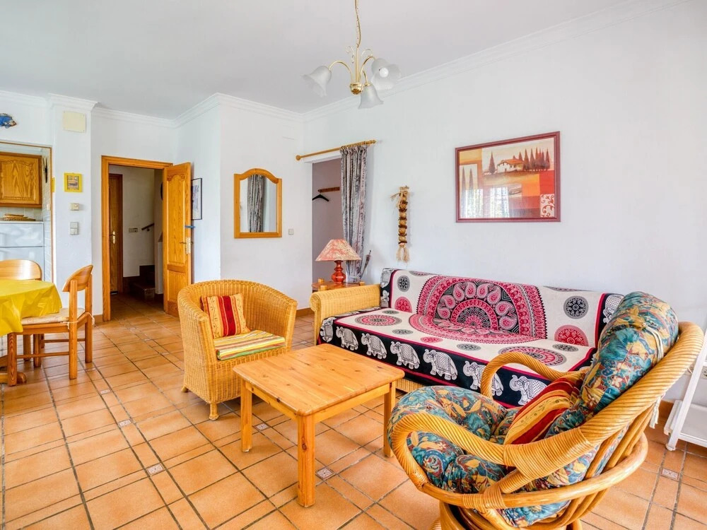 Cosy Townhouse in Vilamacolum With Shared Garden and Swimming Pool