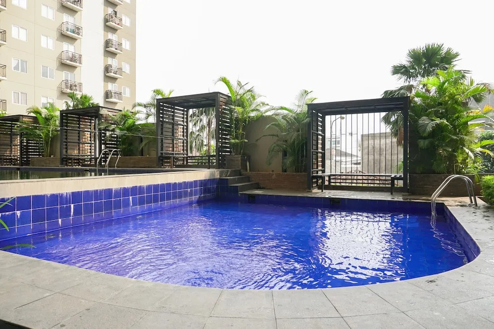 Warm and Cozy 1BR Puri Park View Apartment