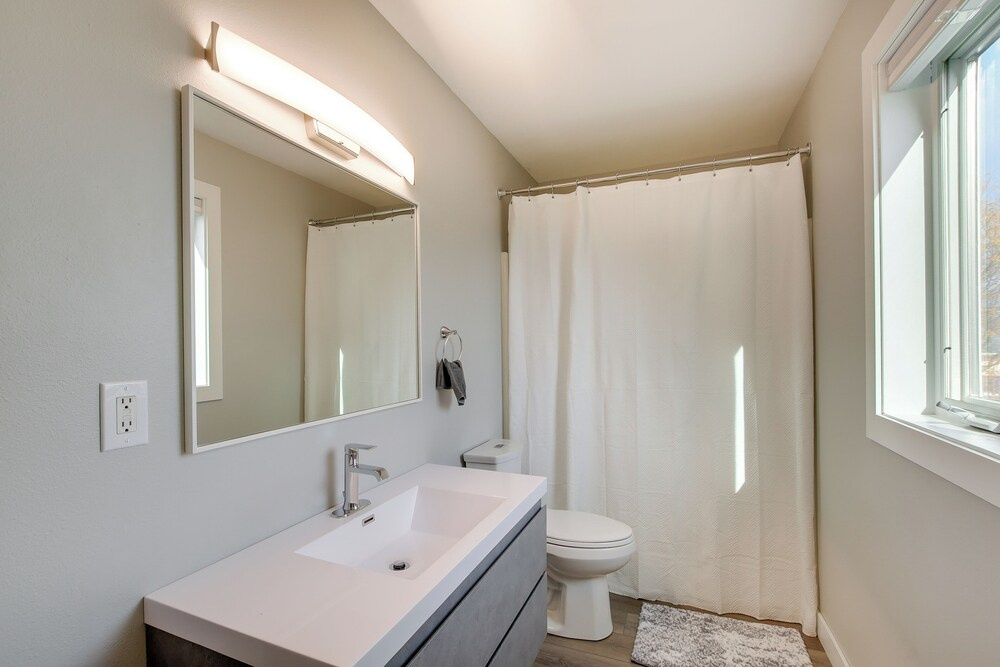 Bright Little Chute Condo w/ Deck & Yard!