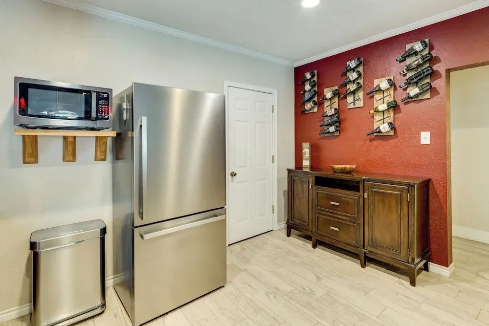Hot Tub + Outdoor Kitchen: Stylish Home in Bryan
