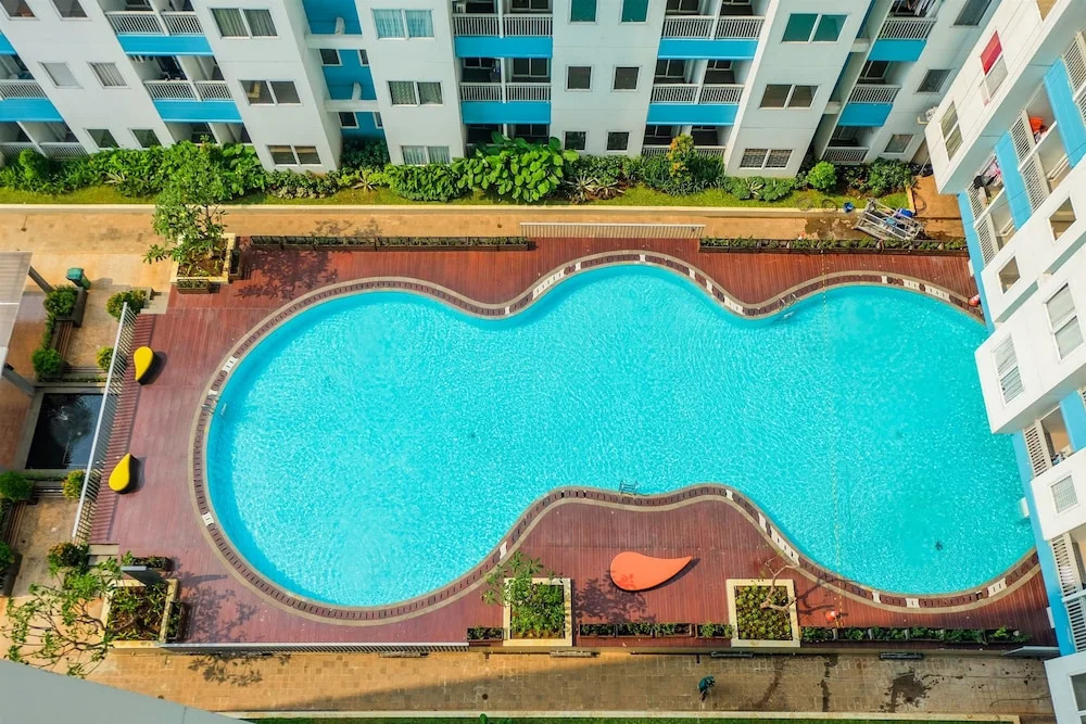 Brand New Compact Studio The Nest Puri Apartment By Travelio