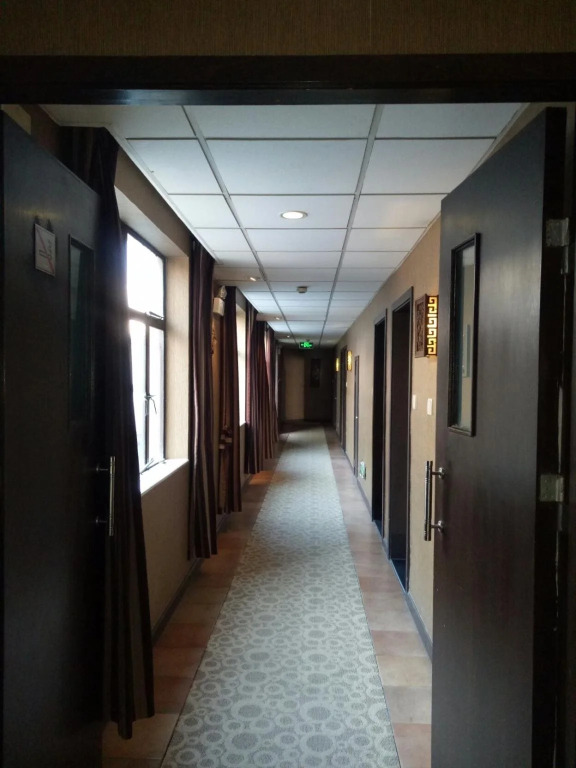 Baolong Homelike Hotel (Youyi Branch)