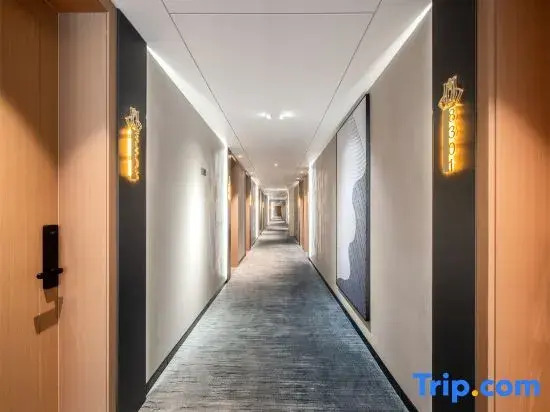 Magnotel Hotel (Taian Xintai Qingyun Shopping Center Jindou Road)