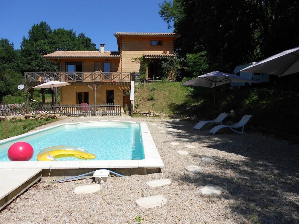 Apartment Facing the Pool in a Wooden House