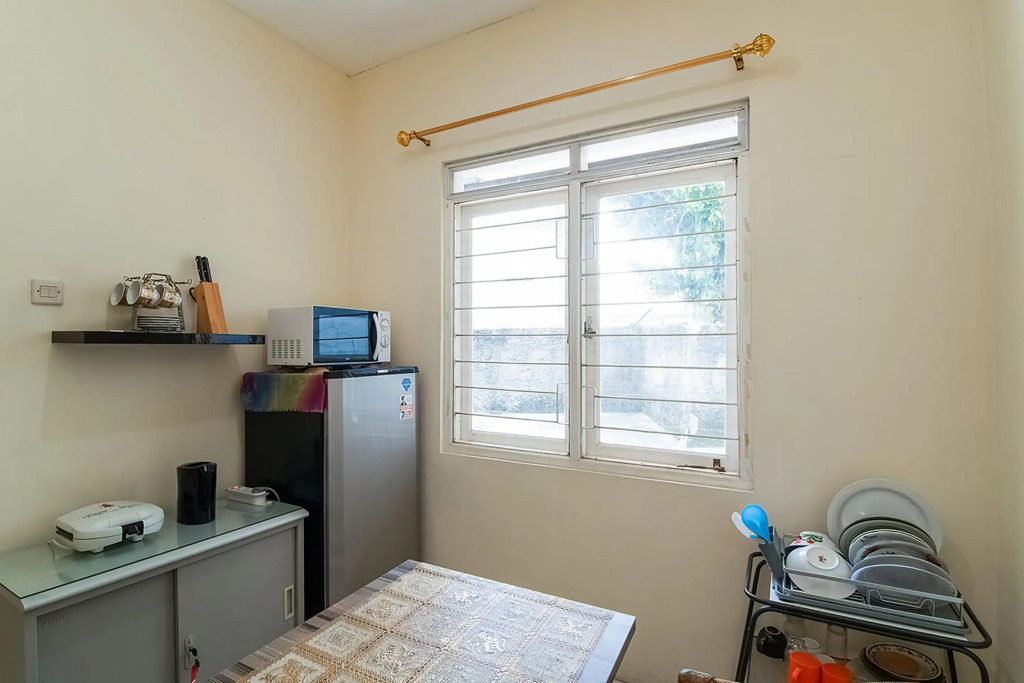 Spot On 3988 Kost Carmelia Baranangsiang Syariah