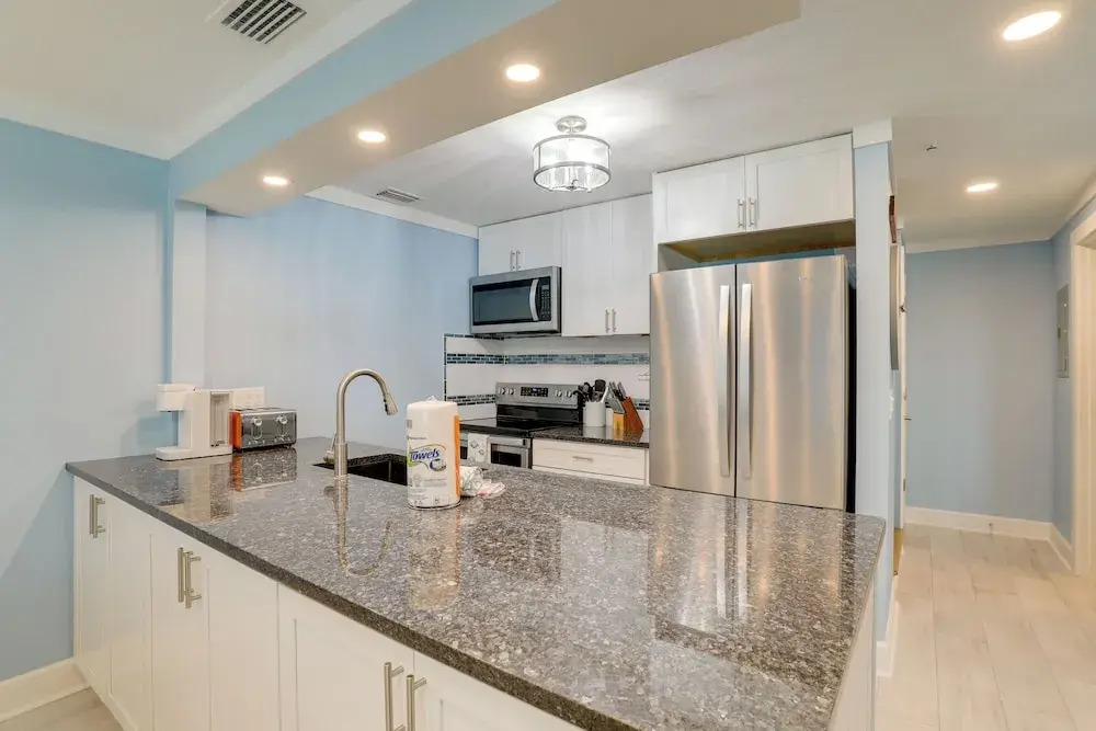 Sip, Sunbathe & Relax Poolside: Madeira Beach Gem!