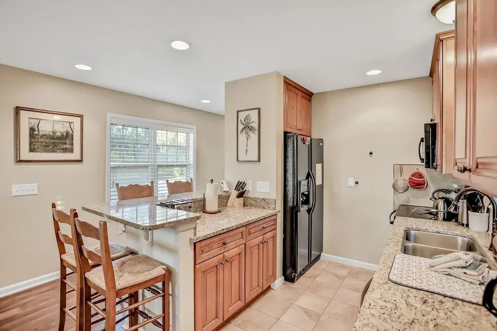 Inviting Waterfront Cottage w Separate Garage Apartment and Stunning Marsh View