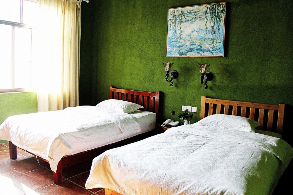 Yangshuo Edens Social Guesthouse - cozy garden courtyard & fresh craft coffee & night beers & outdoor activities
