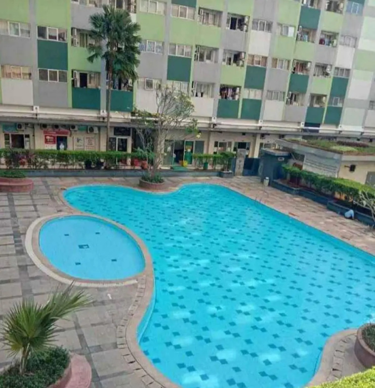 THE ROOMOS Hotel Apartemen