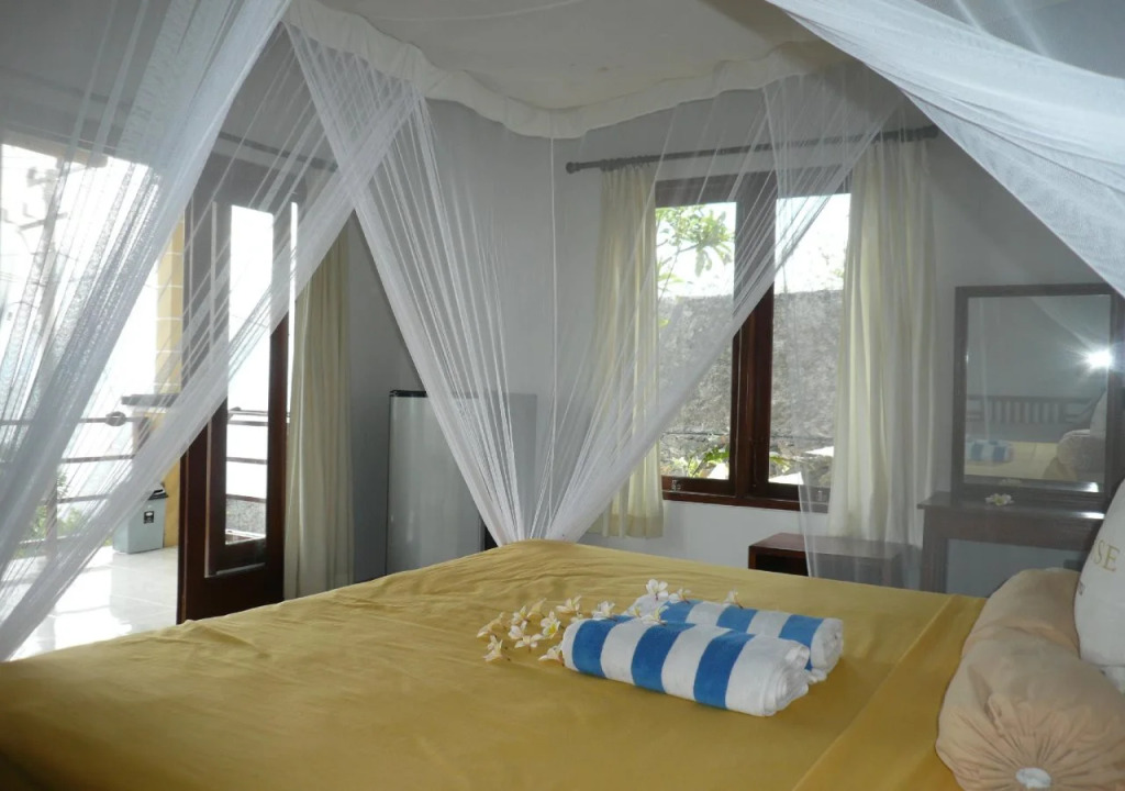 Paradise Palm Beach Bungalows and Dive Center