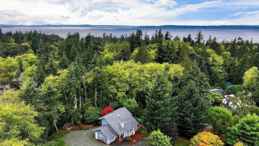 Forest Front Home w/ Fire Pit, Mins to Beaches, Wineries & Trails Cedarview Retreat by Avantstay