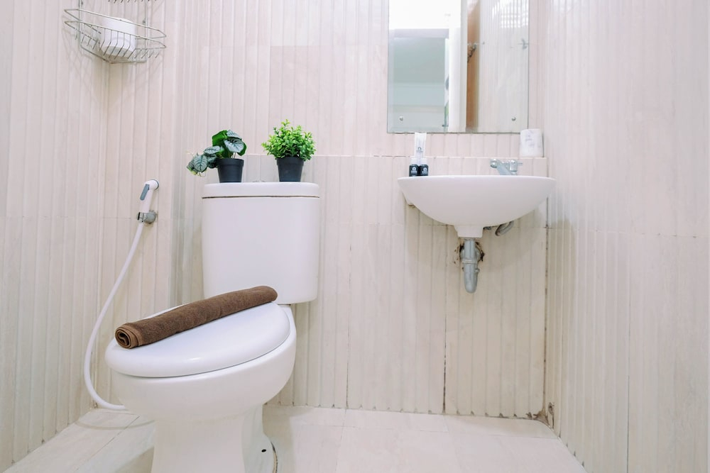 Compact White Tone 2Br At Pakubuwono Terrace Apartment