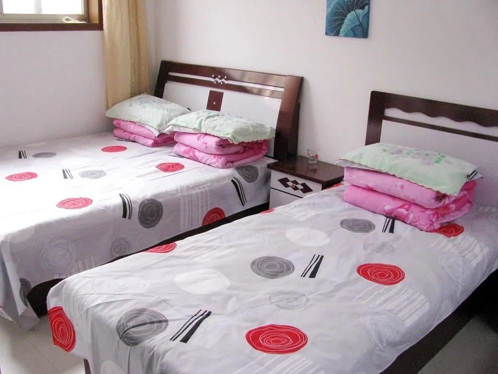 Rongjun Yujiale Hotel(蓬莱荣君渔家乐)