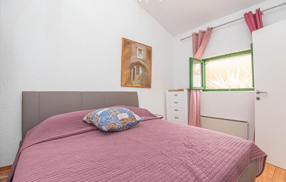 Awesome Home in Jezera with Hot Tub, WiFi & 1 Bedrooms
