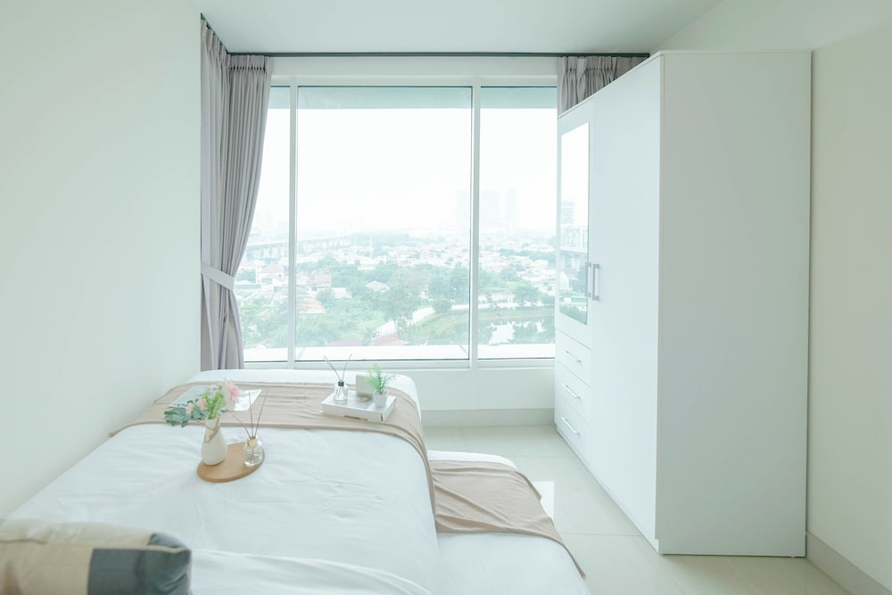 Modern Peach Touch 2Br At Grand Kamala Lagoon Apartment