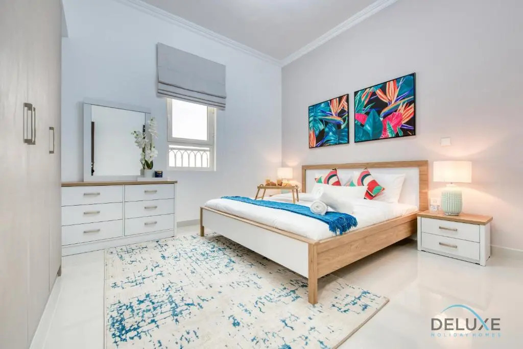 Vivid 2BR at Canal Residences West Dubai Sports City by Deluxe Holiday Homes