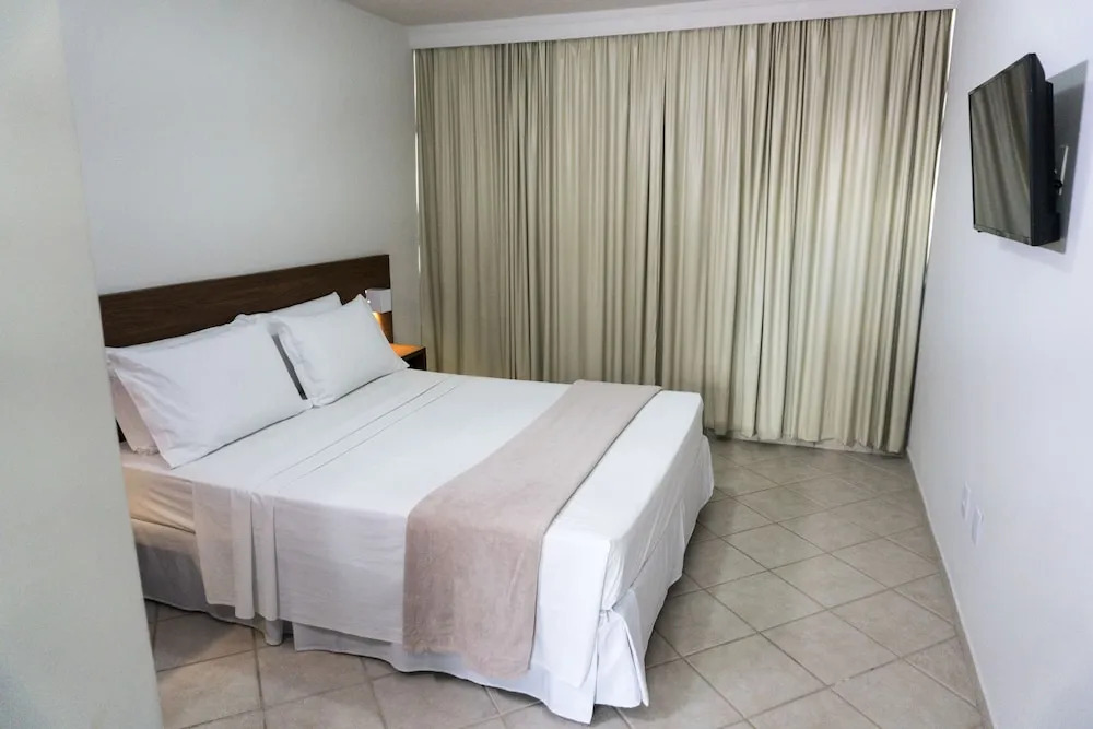 Flat Laranja Apart Hotel