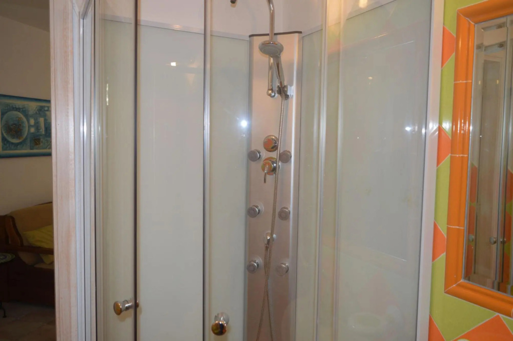 Apartment surrounded by greenery 5 minutes on foot from the beaches of Baia Caddinas and the large s-S'Abba e sa Pedra