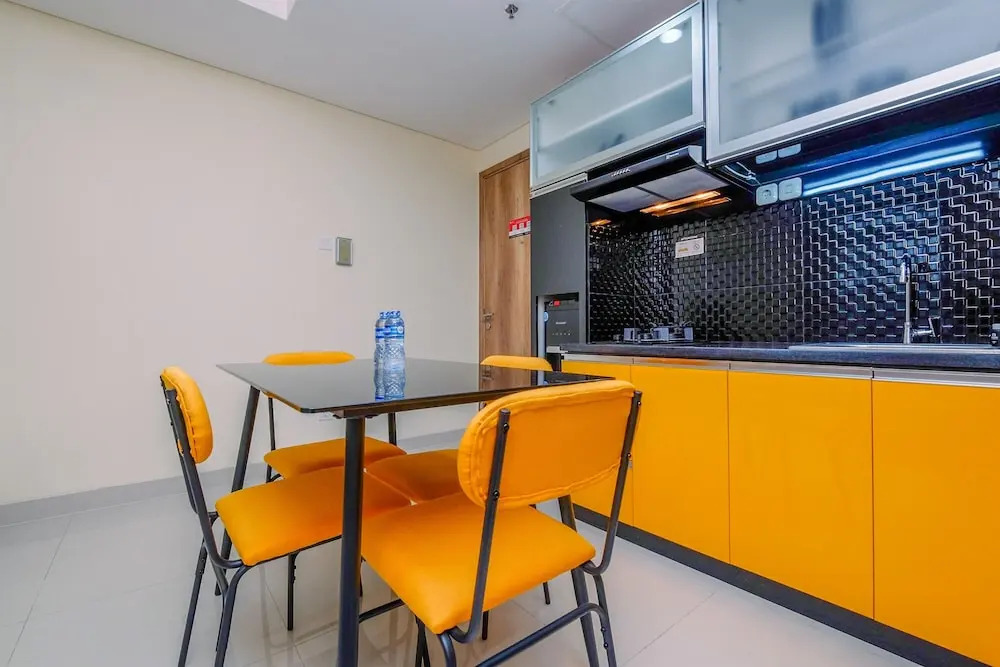 Homey and Fully Furnished 1BR Apartment at Pejaten Park Residence By Travelio