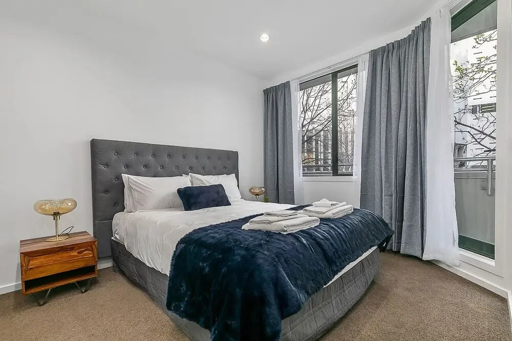 Zodiak Central 2 BR Apt Free Parking Gym
