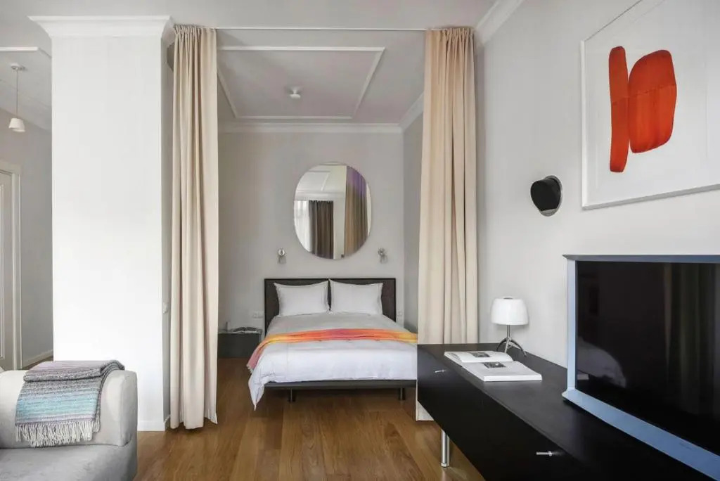 Design Central Studio Apartment with Balcony by Hostlovers