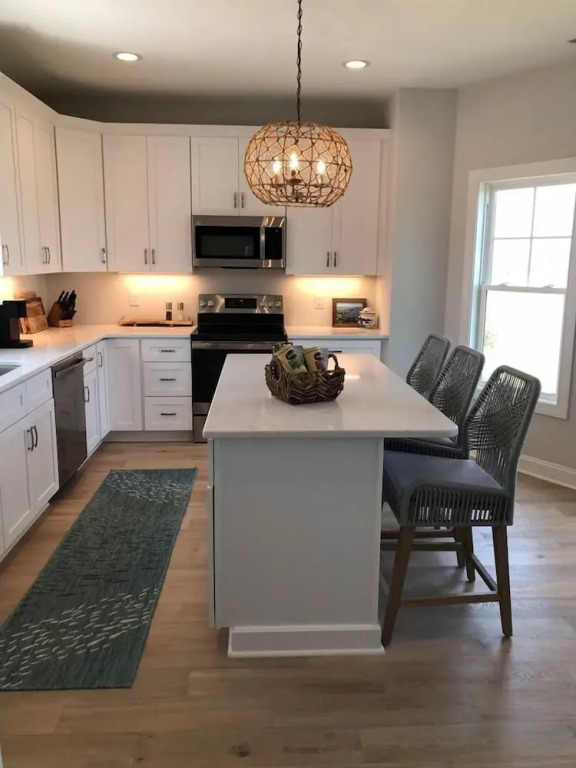 Sun-kissed Mermaid / 846 Ocean Blvd West 2 Bedroom Home by RedAwning