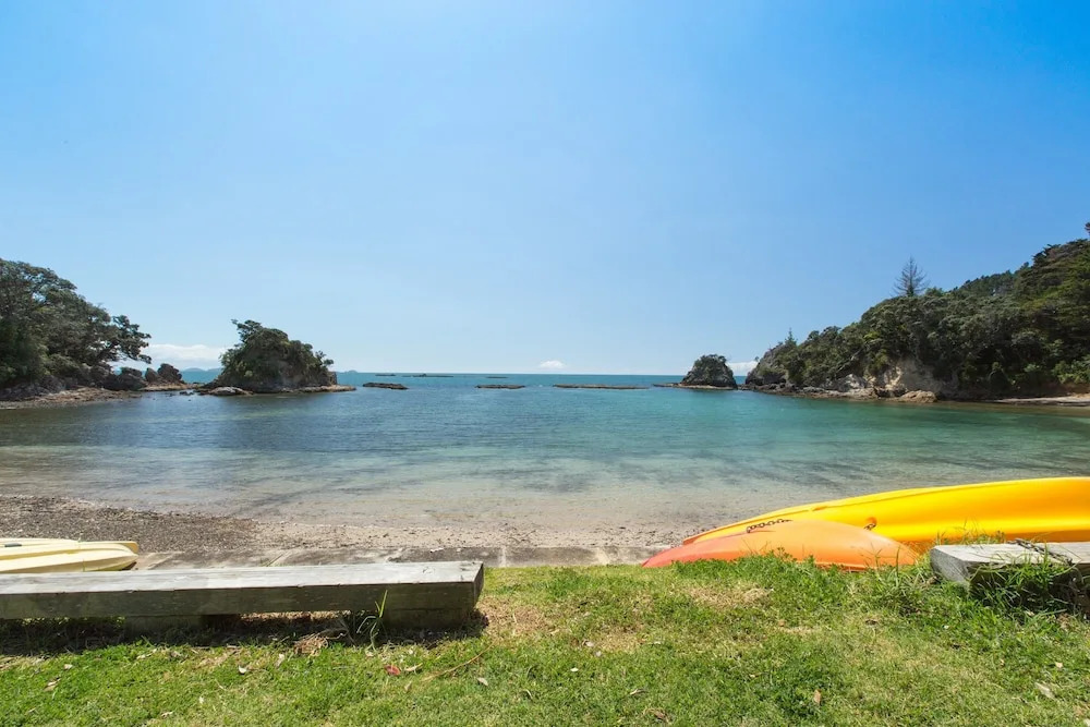 Drop Anchor at Enclosure Bay Beach by Waiheke Unlimited
