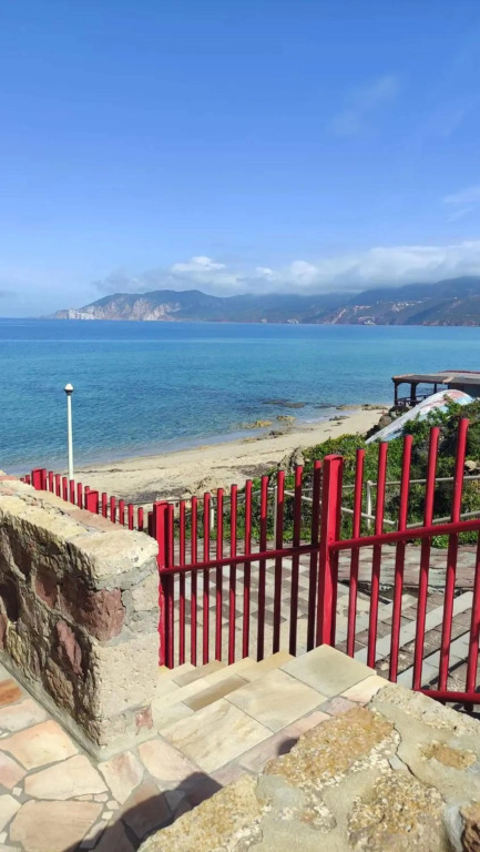 2 bedrooms house at Gonnesa 20m away from the beach with sea view and furnished terrace