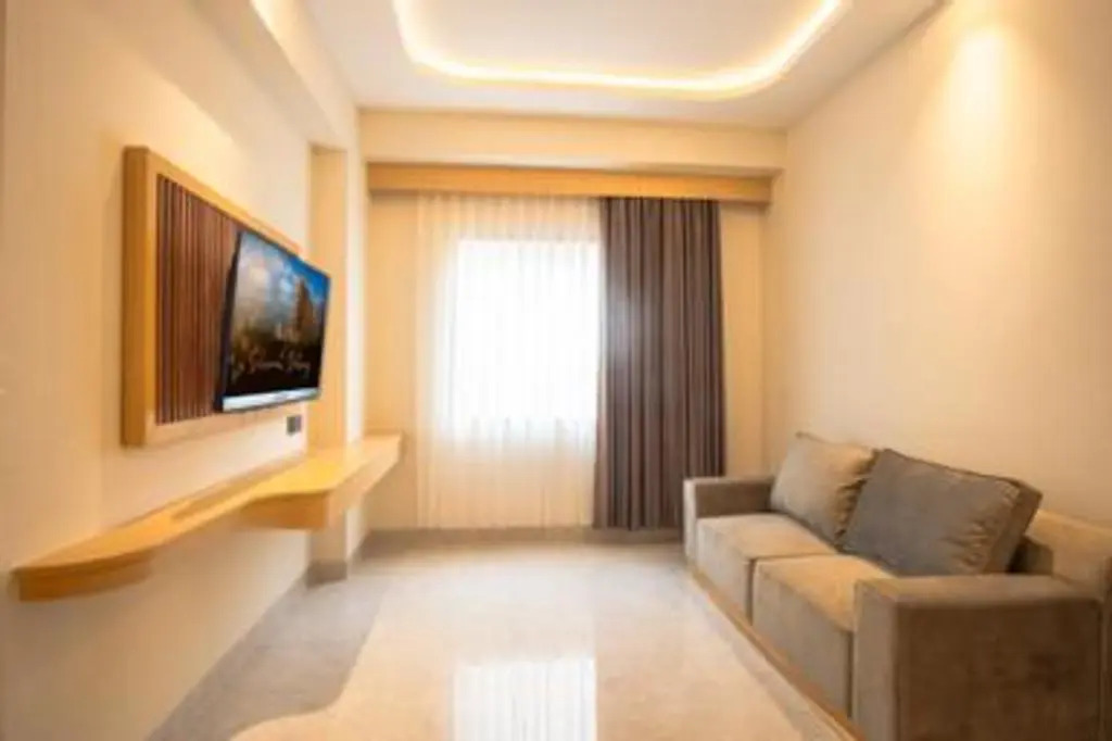 Cozy Stay Studio Room at Altuz Seturan Yogyakarta Apartment By Travelio