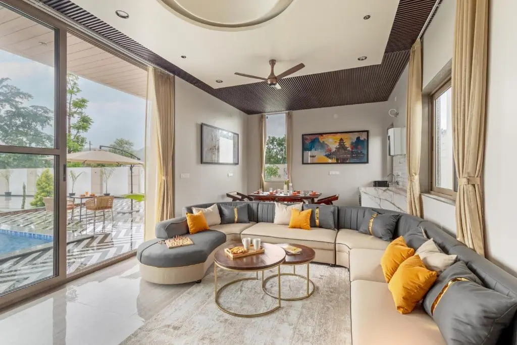 SaffronStays Raaga - luxury 4BR villa with private pool, lawns, gazebos & sweeping Aravalli hill vie