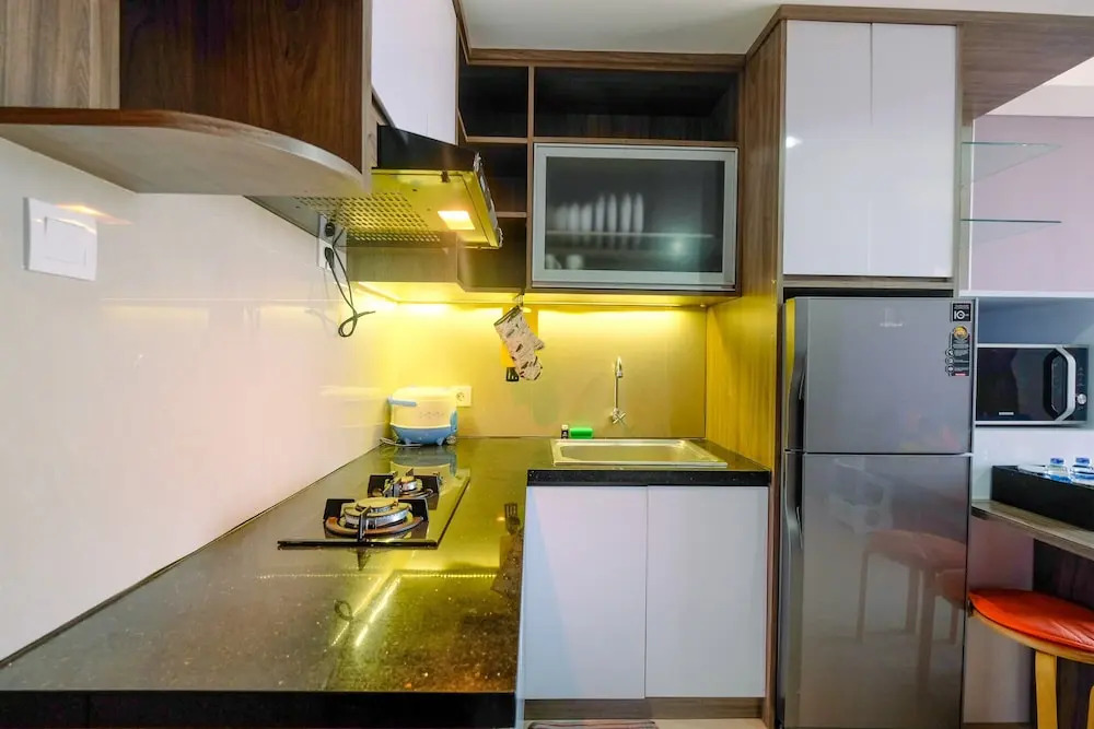 Homey and Modern 2BR Apartment at Royal Olive Residence