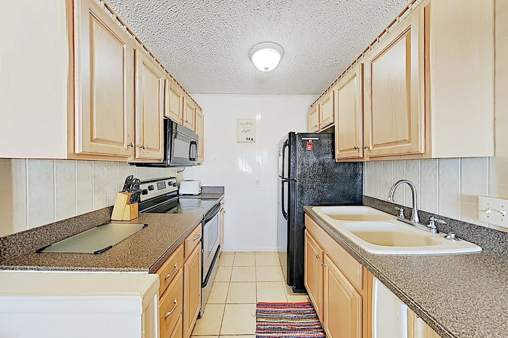 New Listing! Bayfront Getaway W/ Pool - Near Beach 2 Bedroom Condo