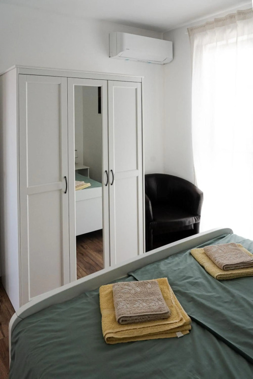 Station 22 - Brand new apartment with a terrace and private parking