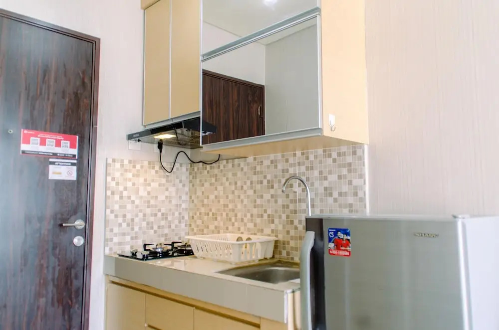 Cozy and Minimalist Studio at Serpong Greenview Apartment By Travelio