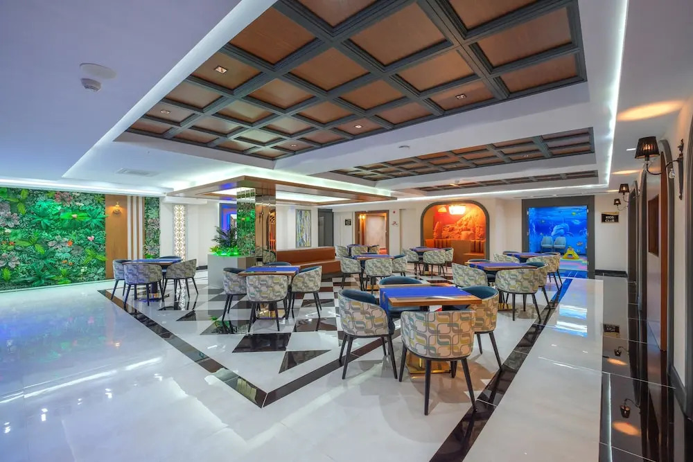 Отель Elysium Deluxe Suites