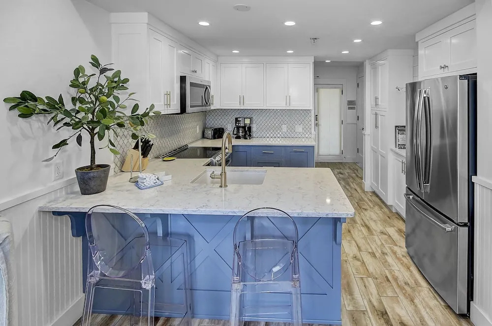 Beach And Gulf Views From The Center Of Seaside! 2 Bedroom Condo by RedAwning