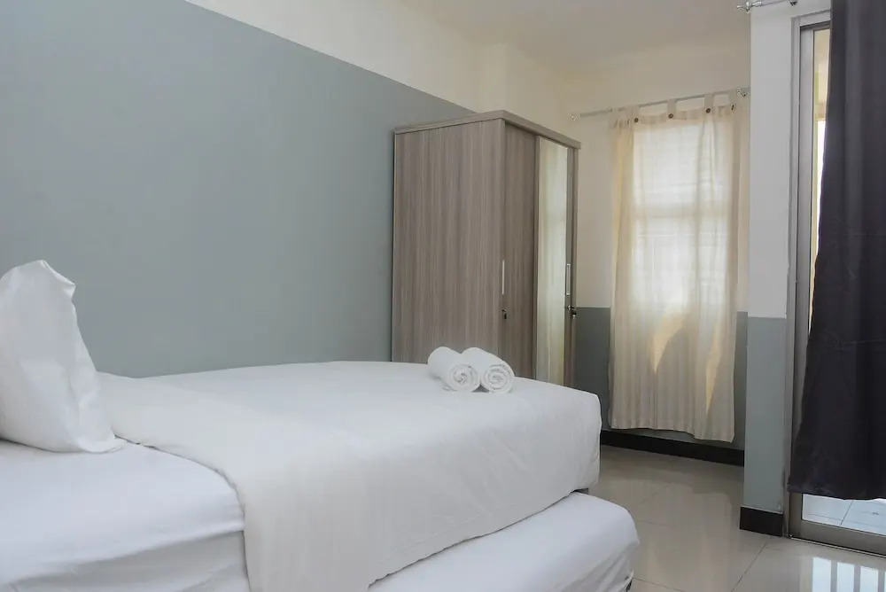 Fancy and Nice Studio at Belmont Residence Puri Apartment By Travelio