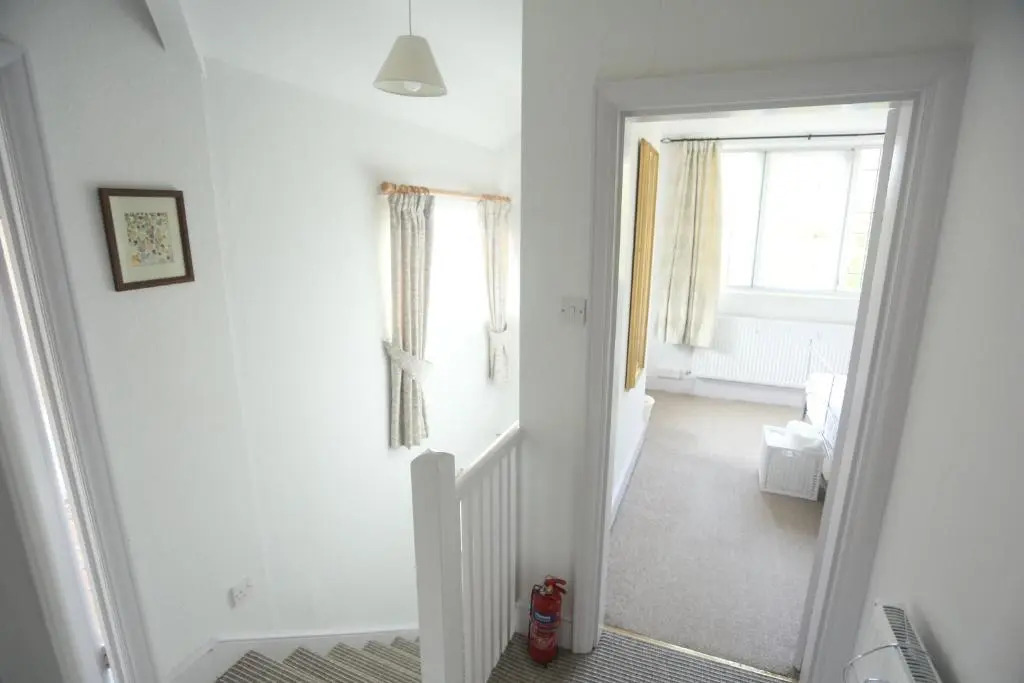 Entire Victorian Lodge in a privately gated estate with secure parking for two cars and a newly refurbished bathroom