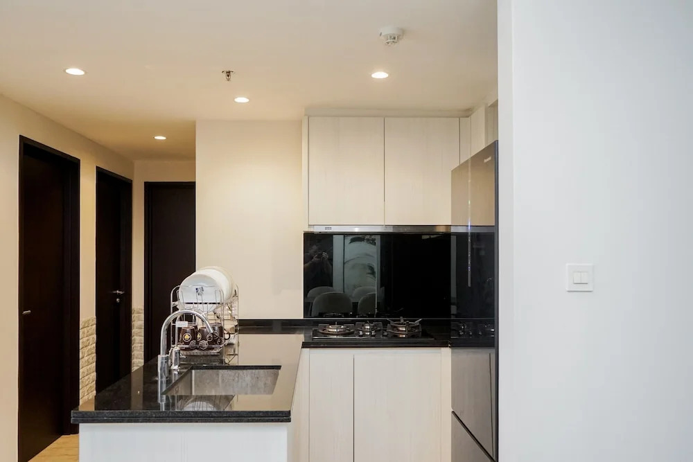 Scenic and Comfortable 2BR Branz BSD City Apartment By Travelio