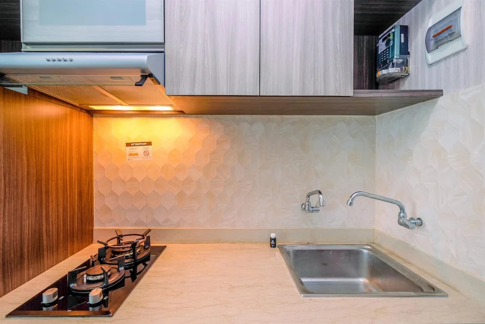 Comfort and Best Deal Studio at Grand Kamala Lagoon Apartment By Travelio