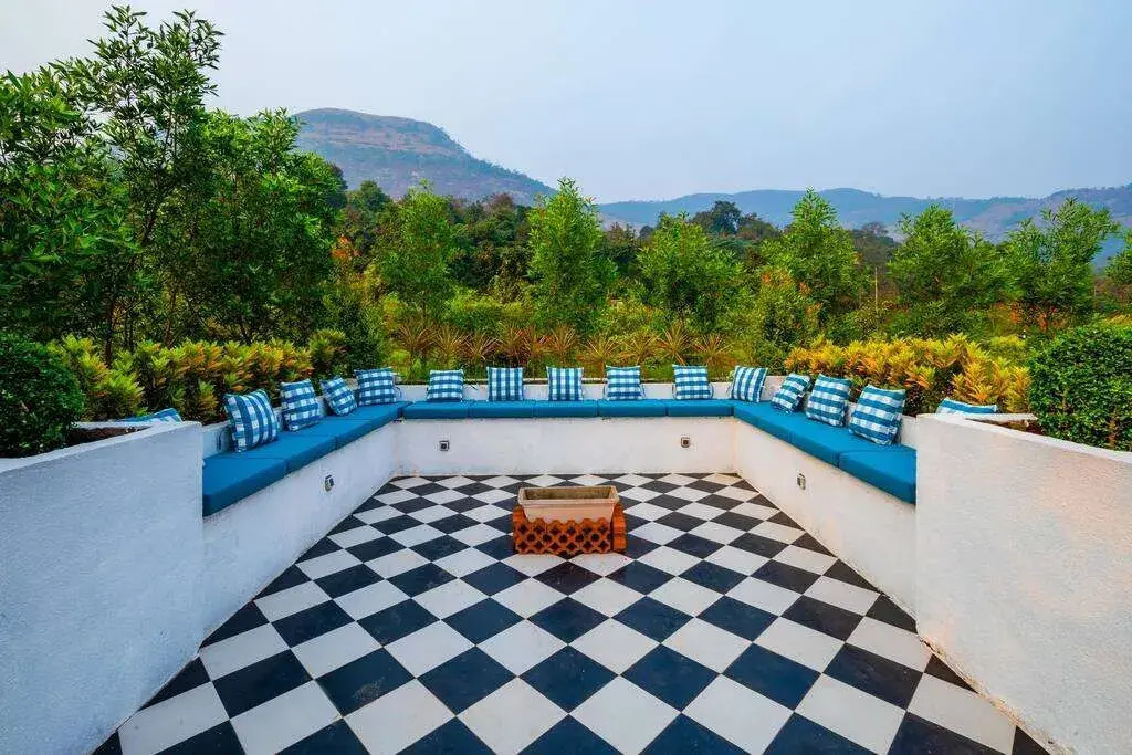 SaffronStays Turquoise Maison - 3BR pool villa with jacuzzi, bonfire & fruit garden near Lake Kalote, Karjat