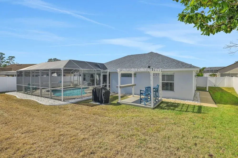Contemporary Coastal Escape With Heated Pool, Fenced Yard, & Outdoor Dining