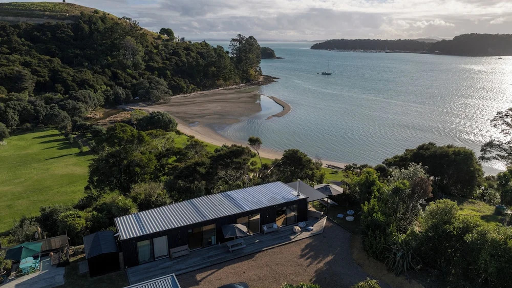 Wharetana Bay Villa with private walkway to beach