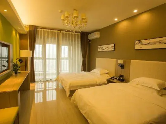 Yuexi Boutique Hotel (Xinyang East Railway Station Evergrande Plaza)