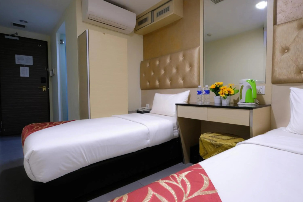 Single or Twin No Window Room With Sharing Bathroom and Toilet in Sandpiper Hotel