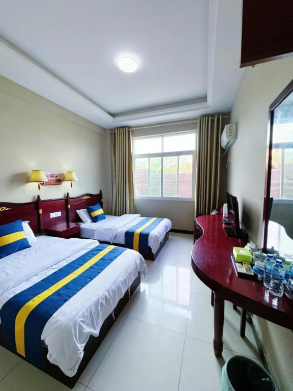 XiShuangBanNa International Aerial Garden South of Mekong River Business Hotel 傣江南商务酒店
