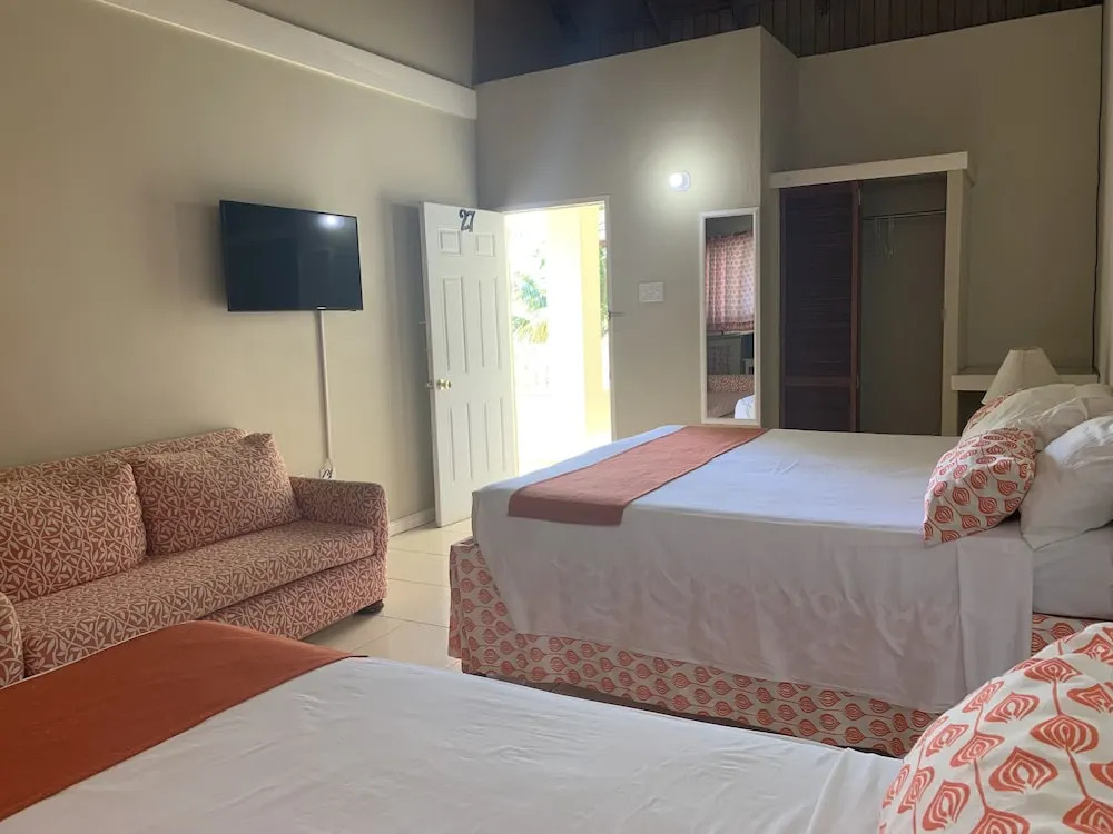 King Suite at Oceanview Resort in Jamaica - Enjoy 7 Miles Of White Sand Beach! 1 Bedroom Villa by RedAwning