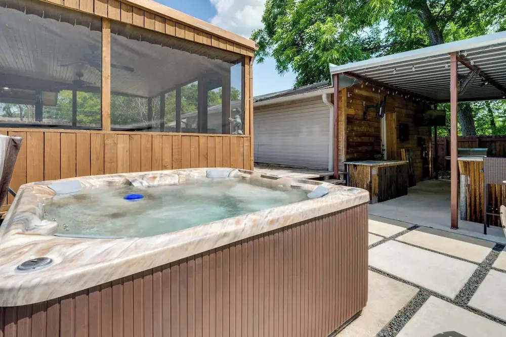 Hot Tub + Outdoor Kitchen: Stylish Home in Bryan
