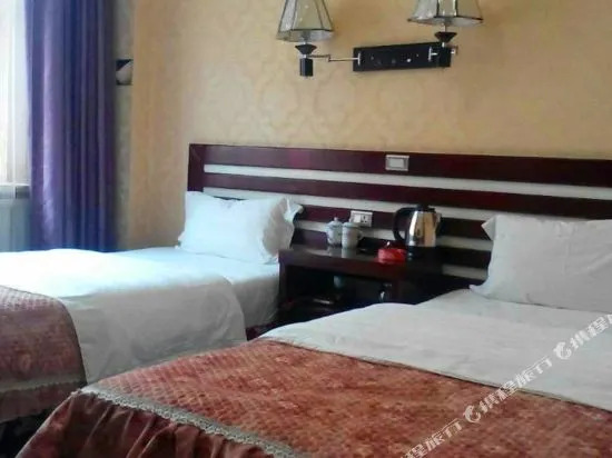 Linjiang Guanglong Business Hotel
